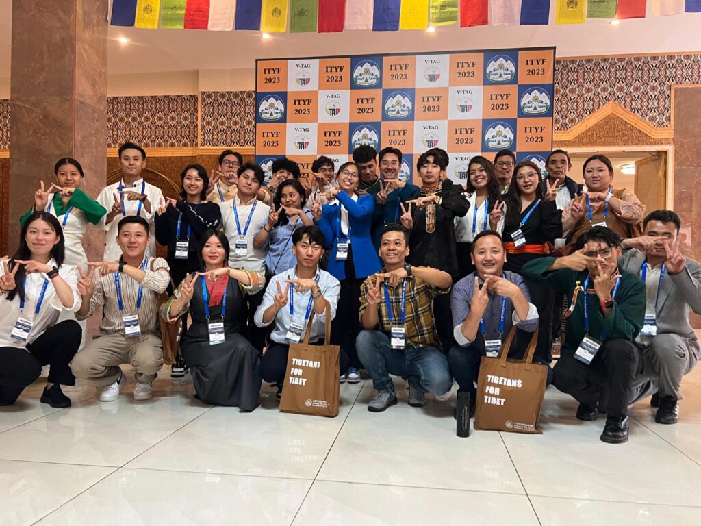 A group picture of V-TAG Europe Tibetan youth members posing for the picture.